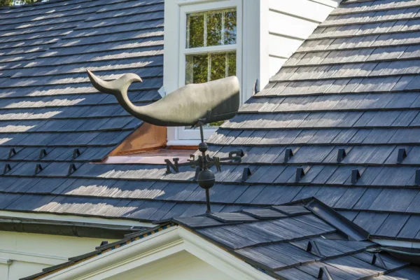 Aged cedar shake roofing on a St. Louis home showing weathered gray wood shingles and natural texture